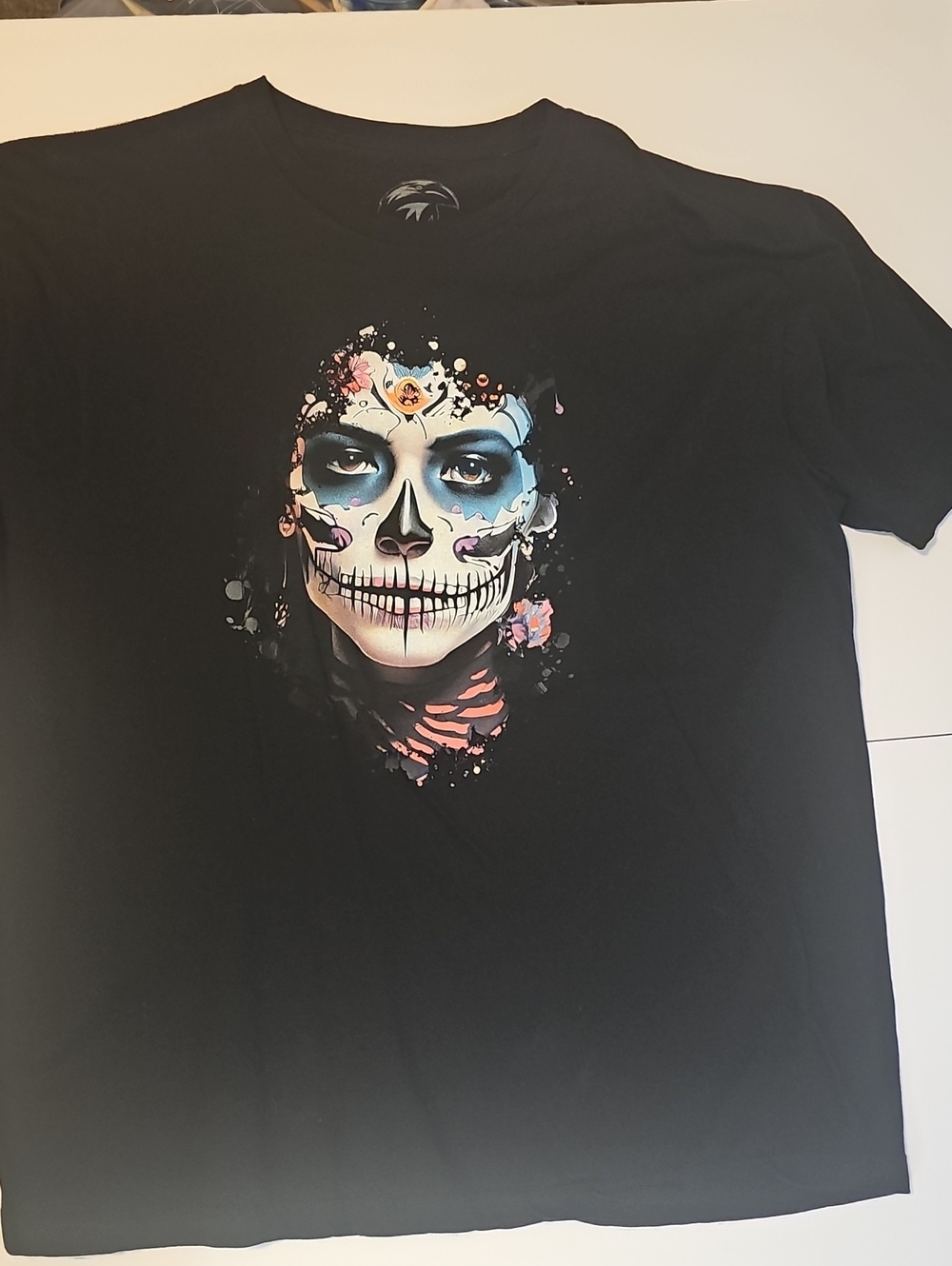 Black Graphic Skull Face Tee with Colorful Accents